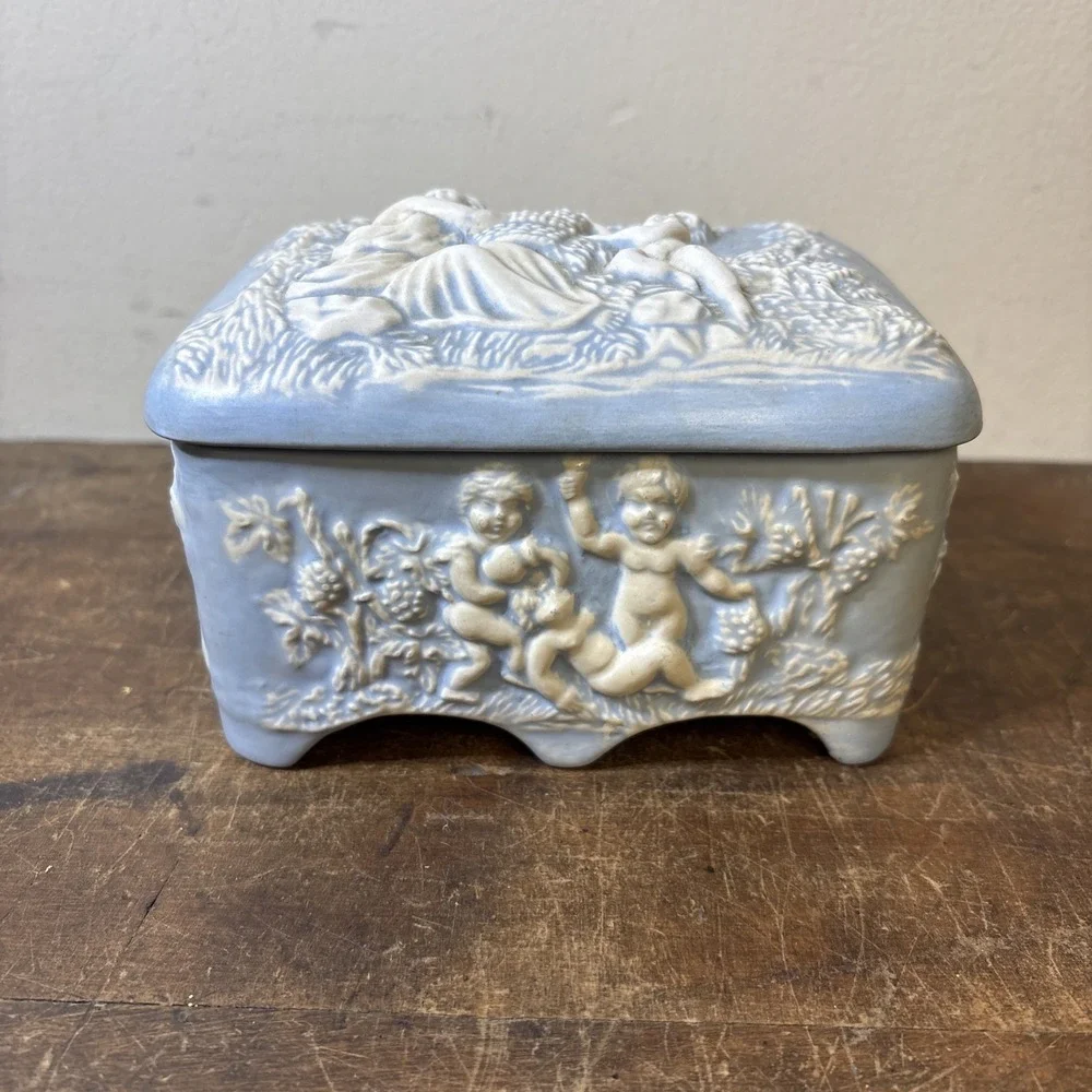 Vintage Blue & White Cherub Relief Music Box Trinket Jew Box Plays Music Footed